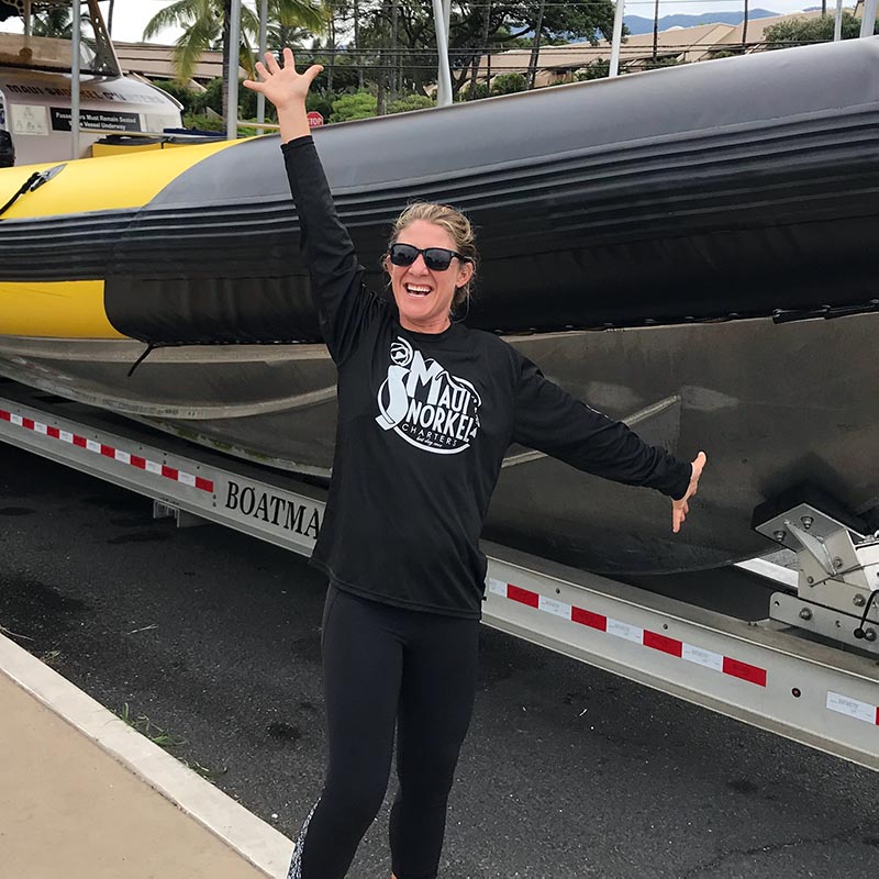 Mandy Finn standing by the boat